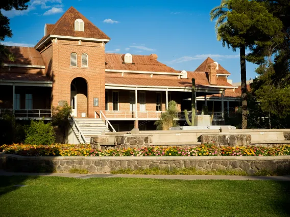 A picture of Old Main and its garden from 1987