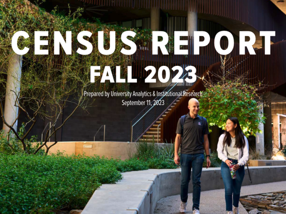 Two students walking on a pathway outside a building during the day. Above the students reads "Census Report Fall 2023 Prepared by University Analytics & Institutional Research September 11, 2023"