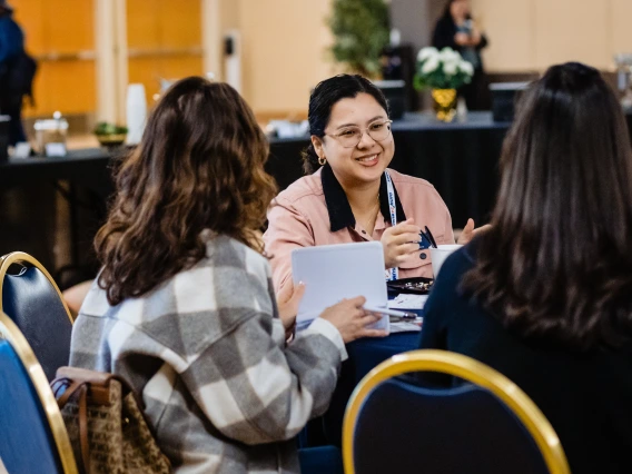 Attendees chatting in the ballroom of the Student Union for the 2024 Data Summit