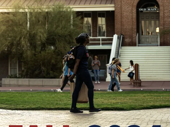 Students walking on campus, in front of Old Main with the text "Fall 2024" overlayed on the image at the bottom.