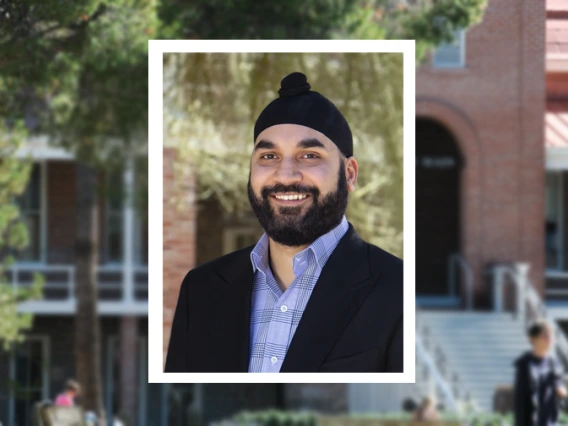 Headshot of Ravneet Chadha, overlaid on a blurred image of Old Main