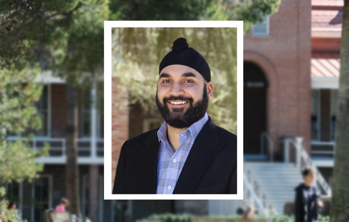 Headshot of Ravneet Chadha, overlaid on a blurred image of Old Main