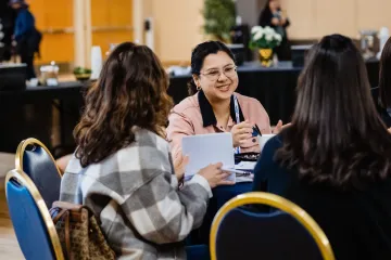 Attendees chatting in the ballroom of the Student Union for the 2024 Data Summit