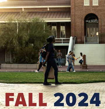 Students walking on campus, in front of Old Main with the text "Fall 2024" overlayed on the image at the bottom.