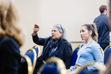 Attendee asking a question at the 2025 data summit