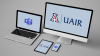 Desktop with UAIR logo on screen and laptop with MS Teams logo on screen